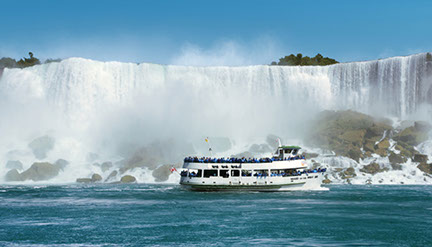 Image of the Maid of the Mist at the foot of Niagara Falls.